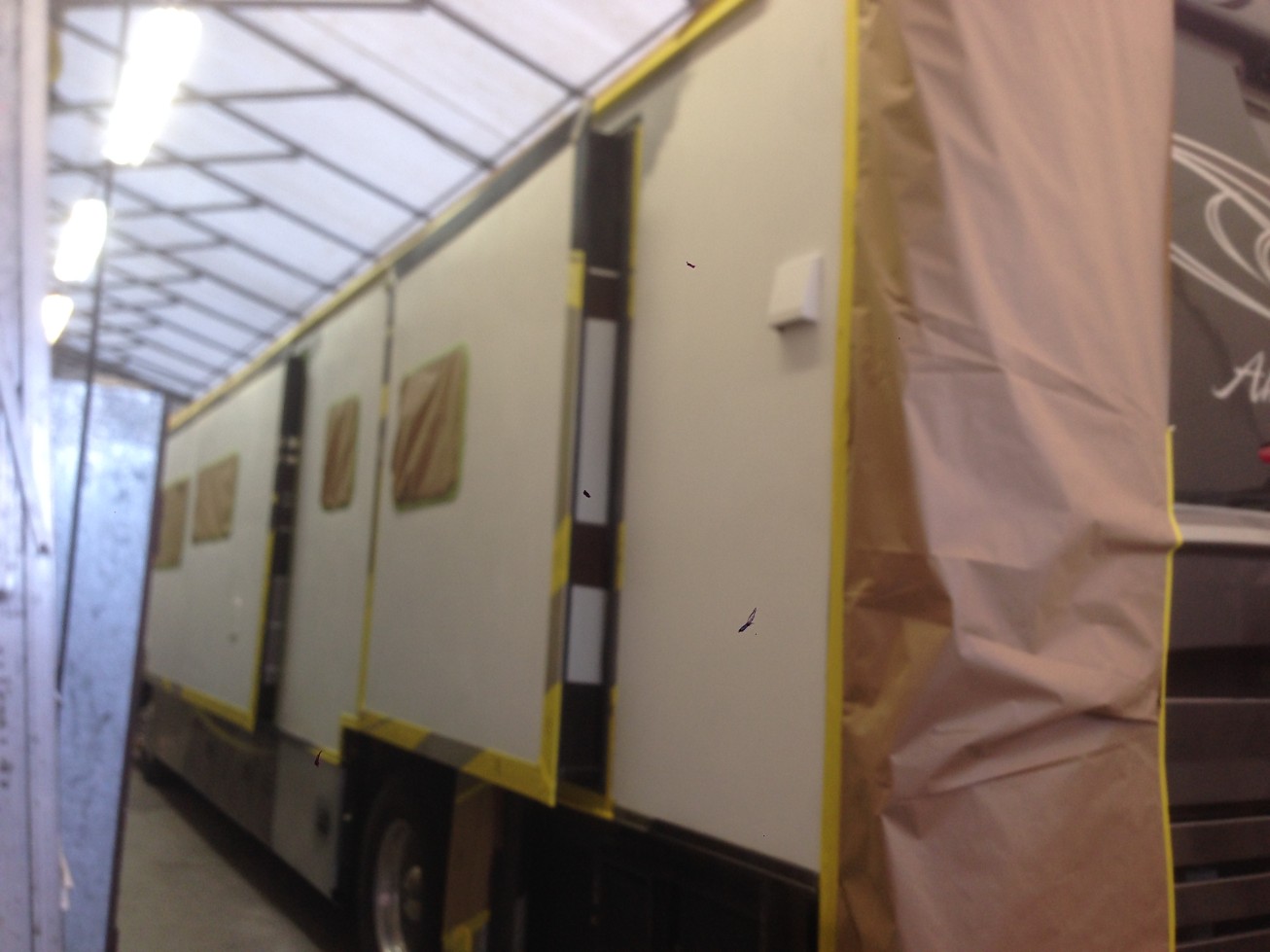 Refinish in-progress, taped up ready for paint, Large RV refinishing